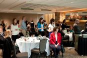 New initiates prepare to recite the oath of membership in Phi Kappa Phi - click to enlarge - opens in new window