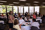 New initiates recite the oath of membership in Phi Kappa Phi - click to enlarge - opens in new window